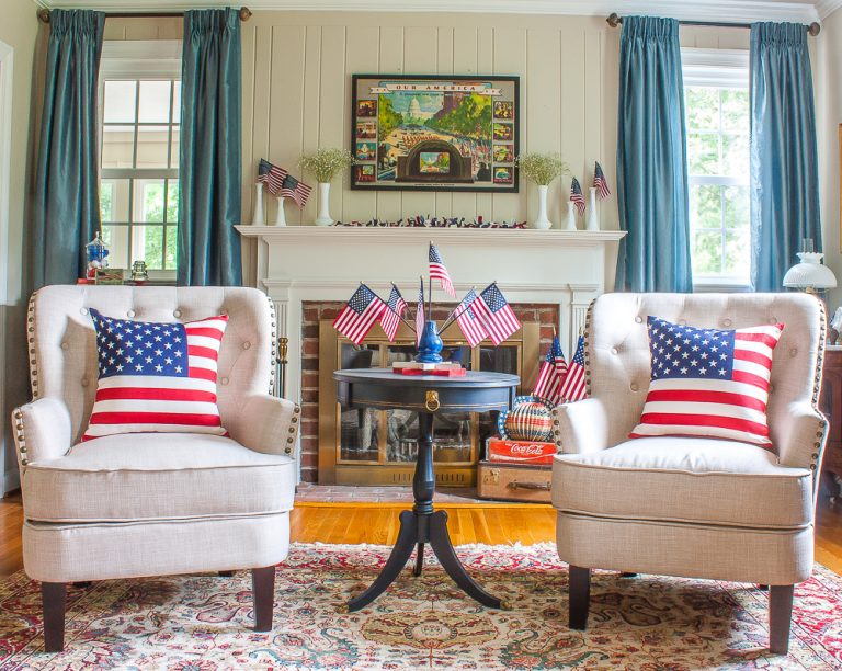 Living room and mantel decorated patriotically with vintage.